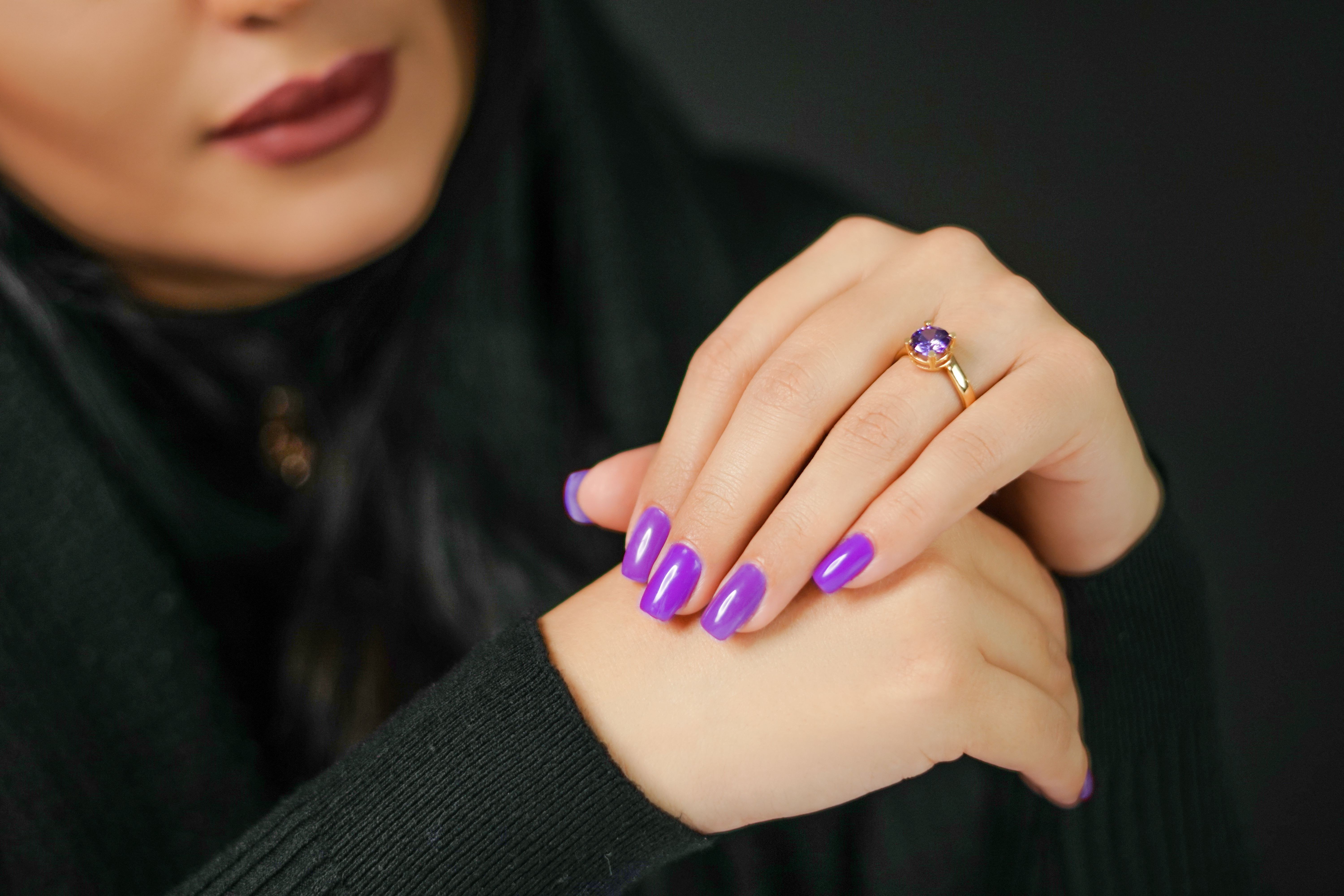 Glossy purple manicure